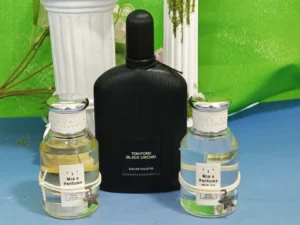 A visual comparison of a traditional 300 dollar luxury black perfume bottle next to a high-concentration factory-direct dark fragrance alternative