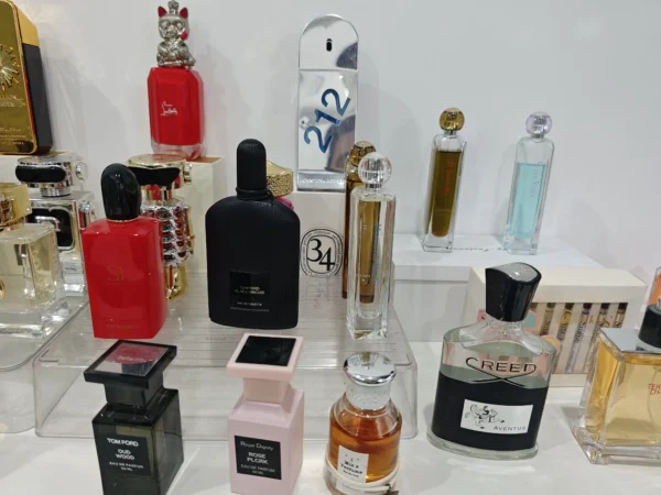 How to Find the Best Berlin Maiden Dupes: A Supply Chain Expert's Guide to Dark Spicy Rose Perfumes in the USA 2 Side-by-side cost comparison of a traditional luxury niche dark rose perfume bottle versus a direct-to-consumer fragrance alternative.