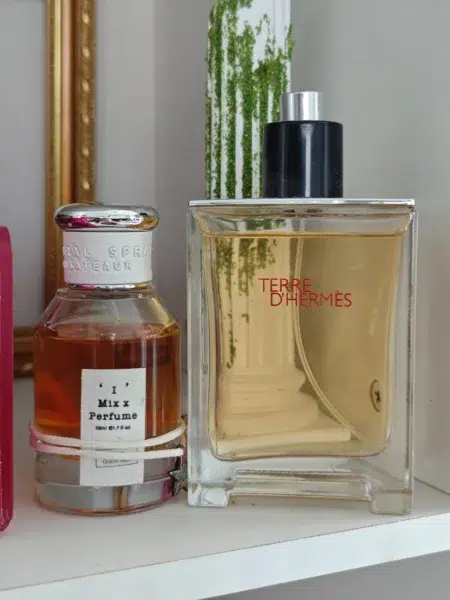 Side-by-side comparison of a luxury designer fragrance and a high-quality Un Jardin Sur La Lagune dupe