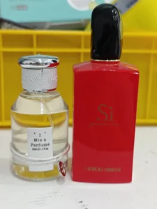 Side-by-side comparison of the luxury designer Giorgio Armani Si perfume bottle and a high-quality, affordable Eau de Parfum dupe alternative.