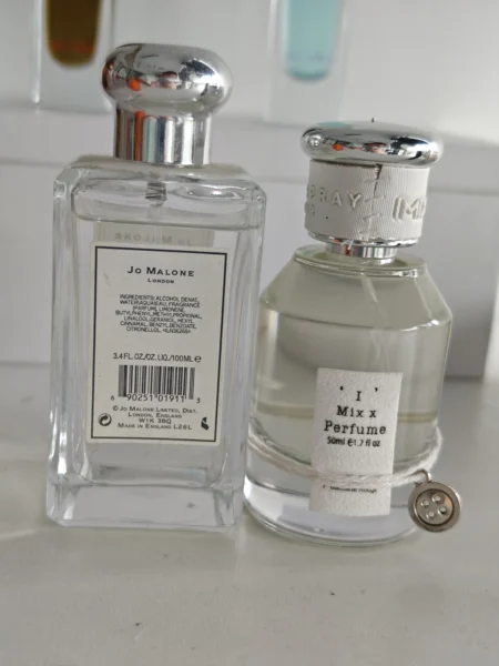 How to Find the Best Jo Malone English Pear and Freesia Dupe in the USA: A Factory-Level Scent Deconstruction 8 Cost structure comparison showing a luxury English Pear and Freesia cologne next to a long-lasting factory direct parfum alternative.