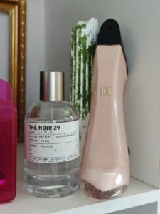 Visual breakdown comparing a luxury designer fragrance to a high-concentration Extrait de Parfum alternative highlighting oil percentages.