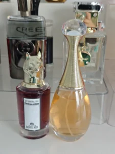 Olfactory notes and concentration comparison between the original golden floral fragrance and IMIXX Perfumes No. 42 alternative.