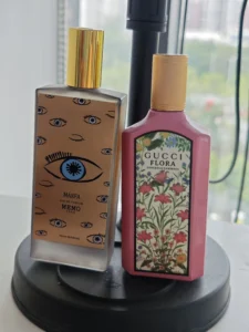 Extrait de Parfum concentration comparison highlighting the Italian mandarin and jasmine grandiflorum notes in a premium Gucci inspired fragrance.