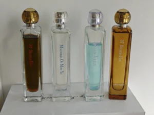 Side-by-side formulation and oil concentration comparison of luxury salty floral perfume versus direct-to-consumer lab alternative.