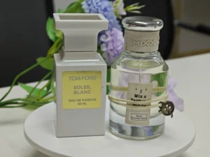 Infographic comparing the retail markup and raw material cost of traditional luxury amber jasmine perfumes versus factory-direct alternatives in the USA