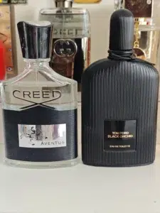 Side-by-side cost and supply chain comparison of a traditional luxury dark floral perfume versus a high-quality USA factory-direct Tom Ford Black Orchid dupe.