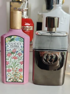 Side-by-side comparison of a $150 luxury designer perfume bottle and a premium factory-direct Gucci Guilty dupe
