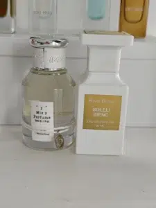 How to Smell Like a Luxury Private Island: The Ultimate US Guide to the Best Tom Ford Soleil Blanc Dupe 1 Side-by-side comparison of an expensive designer summer fragrance and iMIXX No. 20, a high-quality Tom Ford Soleil Blanc dupe.
