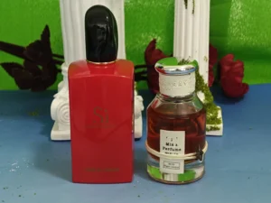 Side-by-side comparison of a traditional $150 designer luxury perfume and an affordable, long-lasting Armani Si dupe by iMixx Perfumes.