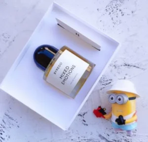 Cost breakdown and packaging comparison between original Byredo Mixed Emotions and iMiXX smoky blackcurrant alternative in the USA.