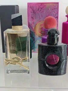 Visual breakdown comparing the fragrance oil concentration and dry-down notes of luxury designer perfumes versus premium YSL dupes.
