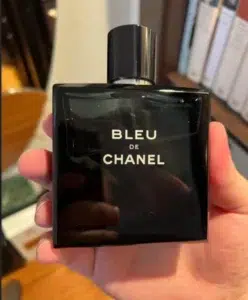 Side-by-side comparison of a designer luxury cologne and a premium Bleu de Chanel clone showcasing formulation differences.