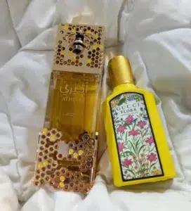 Scent profile comparison chart showing the ozonic and vanilla orchid notes matching a luxury designer fragrance with a high-concentration inspired-by perfume.