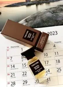 Comparison showing the original Tom Ford Santal Blush luxury fragrance next to a high-concentration creamy sandalwood dupe.