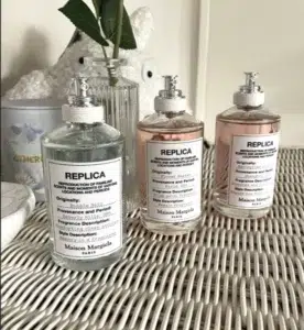 Side-by-side comparison of a luxury designer floral perfume bottle and a high-concentration direct-to-consumer fragrance alternative.