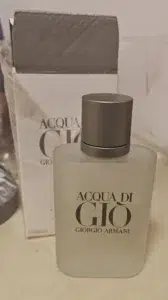 Comprehensive bottle design and concentration class comparison between luxury designer cologne and factory-direct alternative in the USA.