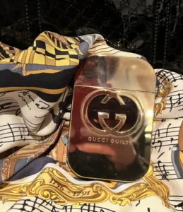 How to Find the Best Gucci Guilty Dupe in the USA: A Factory Insider’s Guide to Perfume Formulations 2 Close-up comparison showing the premium glass packaging and liquid concentration of a high-end designer fragrance versus an affordable independent perfume.