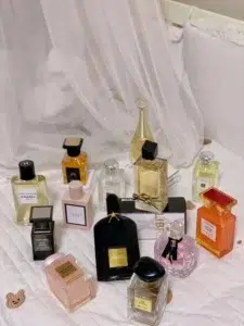 Visual cost breakdown comparing a traditional luxury sweet smelling perfume with a factory-direct fragrance alternative.