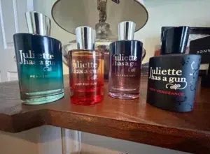 Extrait de Parfum concentration comparison showing the oil density and maceration process of an affordable minimalist skin scent versus traditional high-end Ambroxan fragrances.