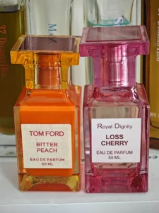 Side-by-side visual comparison of a Tom Ford Bitter Peach luxury perfume bottle and a high-quality affordable USA alternative