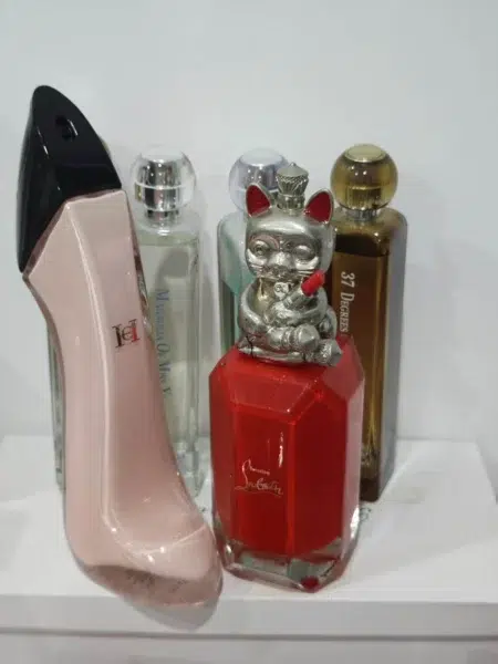 Carolina Herrera Good Girl perfume compared side by side with an affordable Good Girl-inspired fragrance