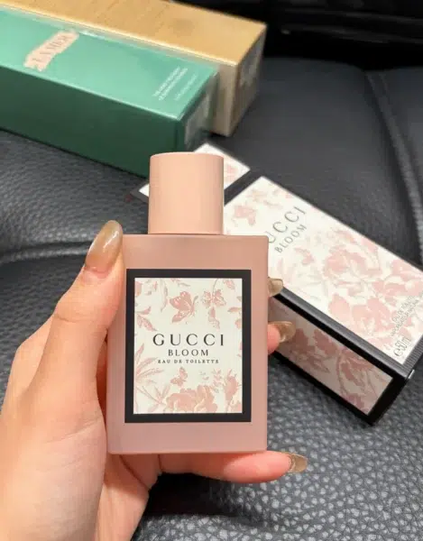 Gucci Bloom perfume and an affordable Gucci Bloom dupe shown side by side for white-floral fragrance comparison