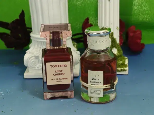 Luxury cherry perfume bottle compared side by side with an affordable inspired fragrance