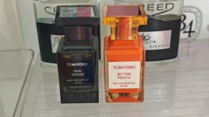 How to Choose the Best Oud Wood Dupe in 2026: A Perfumer’s Guide to Scent Chemistry, Longevity, Dry-Down & Real Value 1 Luxury Oud Wood fragrance beside IMIXX No.48 showing bottle and presentation differences