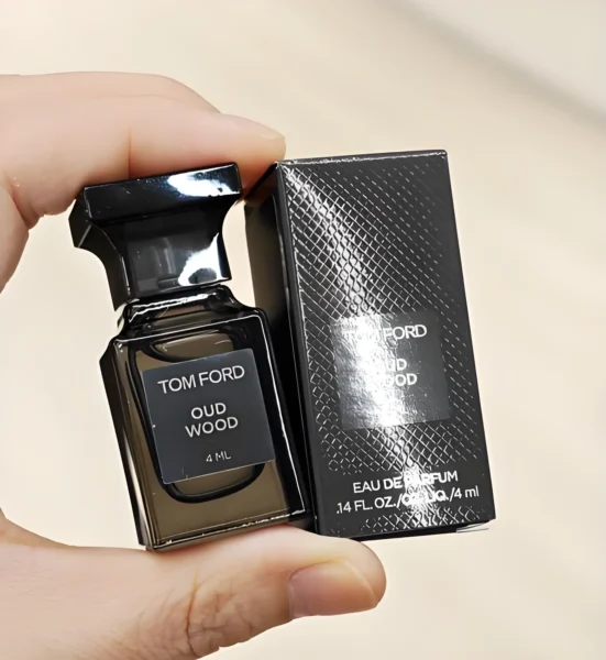 Tom Ford Oud Wood luxury perfume and an affordable woody fragrance alternative side by side