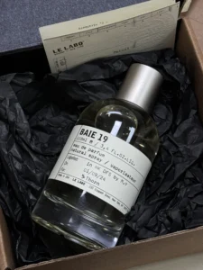 Le Labo Baie 19 and IMIXX No.63 fragrance bottles side by side for scent profile comparison