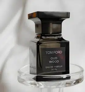 How to Find the Best Tom Ford Oud Wood Clone in the USA: A Perfumer’s 2026 Guide to Scent Architecture, Dry-Down, Longevity & Real Value 2 Luxury oud fragrance and lower-priced Oud Wood alternative compared by bottle design, scent profile, longevity, and value